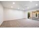 Bedroom featuring neutral carpet and sliding glass door at 4525 N 66Th St # 95, Scottsdale, AZ 85251
