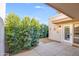 Exterior courtyard featuring desert landscaping and textured walls at 4525 N 66Th St # 95, Scottsdale, AZ 85251