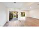 Bright living room with hardwood floors and sliding glass doors to the outside at 4525 N 66Th St # 95, Scottsdale, AZ 85251