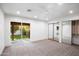 Spacious main bedroom with patio access and mirrored closet doors at 4525 N 66Th St # 95, Scottsdale, AZ 85251