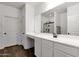 Bright bathroom with a large mirror and vanity with storage at 4595 W Foldwing Dr, San Tan Valley, AZ 85144