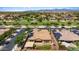 Landscaped home with solar panels adjacent to community park at 4721 N Aldea W Rd, Litchfield Park, AZ 85340