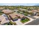 Attractive home with manicured front yard and solar panels on roof at 4721 N Aldea W Rd, Litchfield Park, AZ 85340