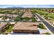 View of a home with solar panels near neighborhood green space at 4721 N Aldea W Rd, Litchfield Park, AZ 85340