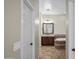 This bathroom features a tile floor and a large soaking tub with a tiled surround at 4721 N Aldea W Rd, Litchfield Park, AZ 85340