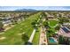 View of large community park with walking path, trees, and green space at 4721 N Aldea W Rd, Litchfield Park, AZ 85340