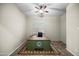 This office includes a custom green built-in desk and tile floor at 4721 N Aldea W Rd, Litchfield Park, AZ 85340