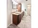 Bathroom with double sink vanity, tile flooring, and modern fixtures at 4838 W Christine Cir, Glendale, AZ 85308