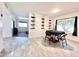 Bright dining area features stylish shelving and neutral tones at 4838 W Christine Cir, Glendale, AZ 85308