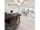 Eat-in kitchen with an island and wood-look floors at 4838 W Christine Cir, Glendale, AZ 85308