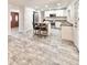 Bright, open kitchen with white cabinets, stainless steel appliances, and a center island at 4838 W Christine Cir, Glendale, AZ 85308