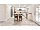 Bright kitchen featuring white cabinets, stainless steel appliances and a spacious center island at 4838 W Christine Cir, Glendale, AZ 85308