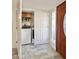 Convenient laundry area tucked away, features modern appliances and storage cabinets at 4838 W Christine Cir, Glendale, AZ 85308