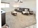 Cozy living room with comfortable seating and plush carpeting at 4838 W Christine Cir, Glendale, AZ 85308