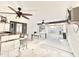 Outdoor patio includes two ceiling fans, outdoor television, and bar area at 4838 W Christine Cir, Glendale, AZ 85308