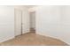 Bedroom with tile flooring, closet, and white walls, offering a clean and bright atmosphere at 5439 W Sands Rd, Glendale, AZ 85301