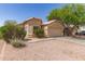 Desirable single-level house with a well-kept lawn and a functional two-car garage at 5439 W Sands Rd, Glendale, AZ 85301