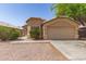 Inviting single-Gathering home with a manicured front yard and a convenient two-car garage at 5439 W Sands Rd, Glendale, AZ 85301