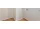 Simple laundry area with tile flooring, white walls, and hookups for a washer and dryer at 5439 W Sands Rd, Glendale, AZ 85301