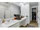 Bathroom boasts quartz countertops, a large vanity and walk-in glass shower at 6145 S Adelle --, Mesa, AZ 85212