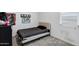 Simple bedroom featuring carpet floors, a comfortable twin bed, and a world map at 6145 S Adelle --, Mesa, AZ 85212