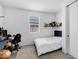 Cozy bedroom with plush toys on shelves, a window, and carpet flooring at 6145 S Adelle --, Mesa, AZ 85212