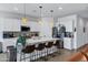 Modern kitchen featuring a large center island with bar seating and stainless steel appliances at 6145 S Adelle --, Mesa, AZ 85212