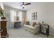 Inviting living room with cozy seating, soft lighting, and elegant decor creating a warm ambiance at 6213 W Gambit Trl, Phoenix, AZ 85083