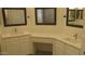 Bright bathroom featuring double sinks, vanity area, and a quartz countertop at 627 W Mendoza Ave, Mesa, AZ 85210