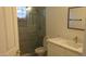 Updated bathroom featuring marble countertop vanity and frameless glass shower at 627 W Mendoza Ave, Mesa, AZ 85210
