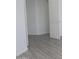 Clean bedroom space, showing the flooring and doorway at 627 W Mendoza Ave, Mesa, AZ 85210