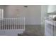 Inviting foyer with beautiful flooring, staircase, and a front door that offers natural light at 627 W Mendoza Ave, Mesa, AZ 85210