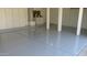 Spacious garage with epoxy flooring and plenty of built in storage cabinets at 627 W Mendoza Ave, Mesa, AZ 85210