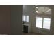 Spacious kitchen with modern appliances, hardwood floors and light-filled windows at 627 W Mendoza Ave, Mesa, AZ 85210