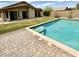 Inviting pool area, perfect for relaxation and outdoor entertaining, with well-maintained landscaping and a spacious patio at 6436 W Saddlehorn Rd, Phoenix, AZ 85083