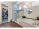Bathroom showcasing a walk-in shower and soaking tub at 70 E Kennedia Dr, Queen Creek, AZ 85140