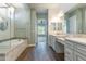 Spa-like main bathroom with marble countertops and walk in shower at 70 E Kennedia Dr, Queen Creek, AZ 85140