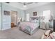 Luxurious main bedroom featuring stylish decor and an en-suite bathroom at 70 E Kennedia Dr, Queen Creek, AZ 85140