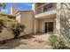 This backyard features a patio, gravel, beautiful plants and a private atmosphere at 7101 W Beardsley Rd # 1502, Glendale, AZ 85308