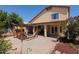 Enjoy the backyard with covered patio, a hammock, and blooming flowers for a relaxing retreat at 725 W Beth Dr, Phoenix, AZ 85041