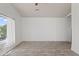 Neutral living room with hardwood floors, a large window, and plenty of natural light at 725 W Beth Dr, Phoenix, AZ 85041