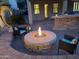 Beautiful backyard boasting a cozy fire pit and comfortable seating for outdoor gatherings at 816 W Sycamore Ct, Litchfield Park, AZ 85340