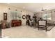 Expansive living room featuring piano, stylish seating, and neutral flooring, perfect for Gathering gatherings at 816 W Sycamore Ct, Litchfield Park, AZ 85340
