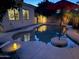 Relaxing pool at dusk, showcasing the tranquil ambiance and built-in island at 816 W Sycamore Ct, Litchfield Park, AZ 85340