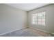 Bedroom with neutral carpet and paint plus a window allowing natural light at 818 S Westwood -- # 101, Mesa, AZ 85210