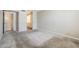 Spacious carpeted bedroom leads into the hallway with the bathroom at 818 S Westwood -- # 101, Mesa, AZ 85210