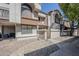 Townhome exterior showcasing stucco walls, tile roof, and well-maintained gravel landscaping on a sunny day at 818 S Westwood -- # 101, Mesa, AZ 85210