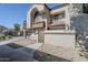 Beautiful townhome exterior with stucco walls, a tile roof, and a peaceful gravel landscaped yard at 818 S Westwood -- # 101, Mesa, AZ 85210