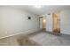 Neutral carpeted bedroom with mounted TV bracket and good closet space at 818 S Westwood -- # 101, Mesa, AZ 85210