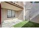 Covered patio area offering tile floors and artificial turf for a relaxed outdoor space at 818 S Westwood -- # 101, Mesa, AZ 85210